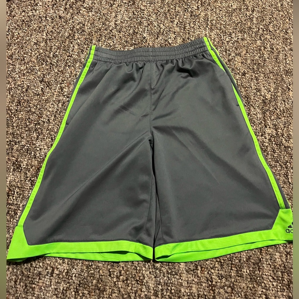 Gray and green adidas shorts